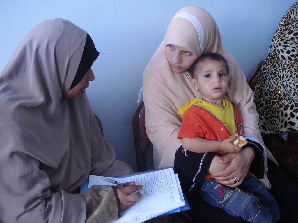 Egyptian mother, child, and health worker